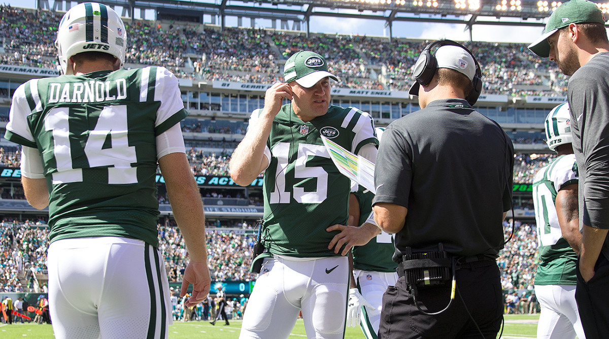 Josh McCown (No. 15) acts like a coach for Darnold, debriefing him after every drive about his decisions.